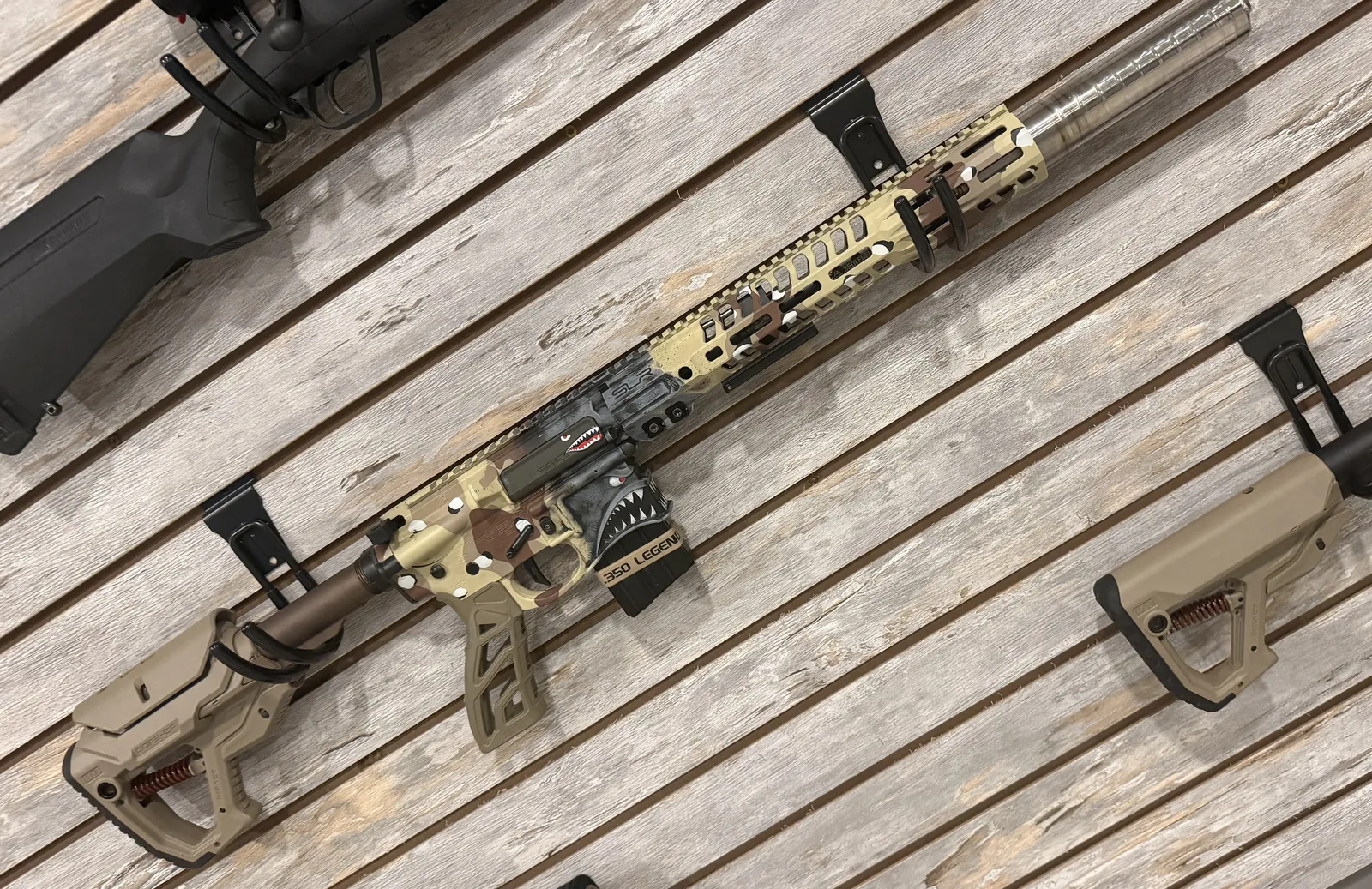 Camo AR chambered in 350 Legend with shark-mouth upper receiver